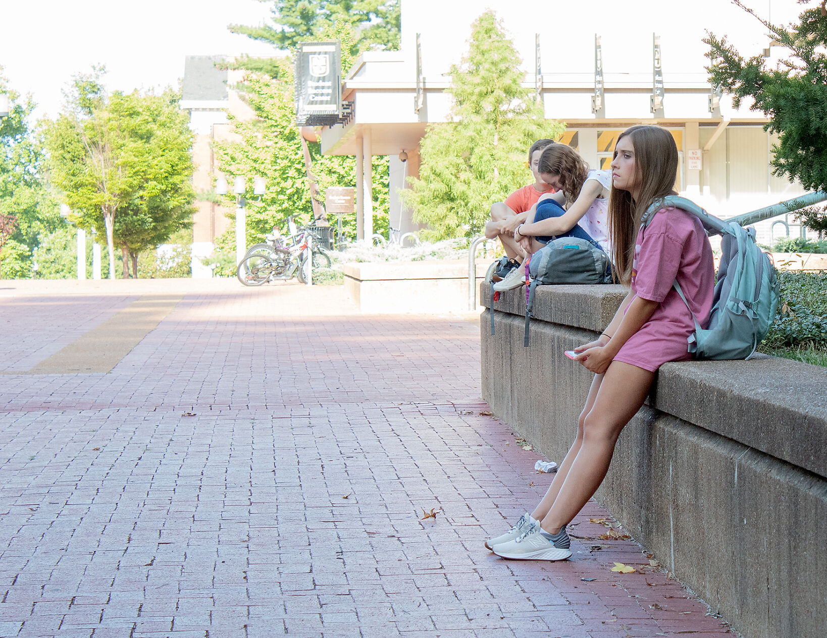 Alyson Craft sits on Lowry Mall